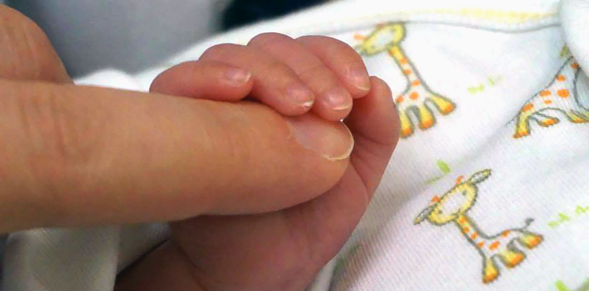 Mother and baby in NICU