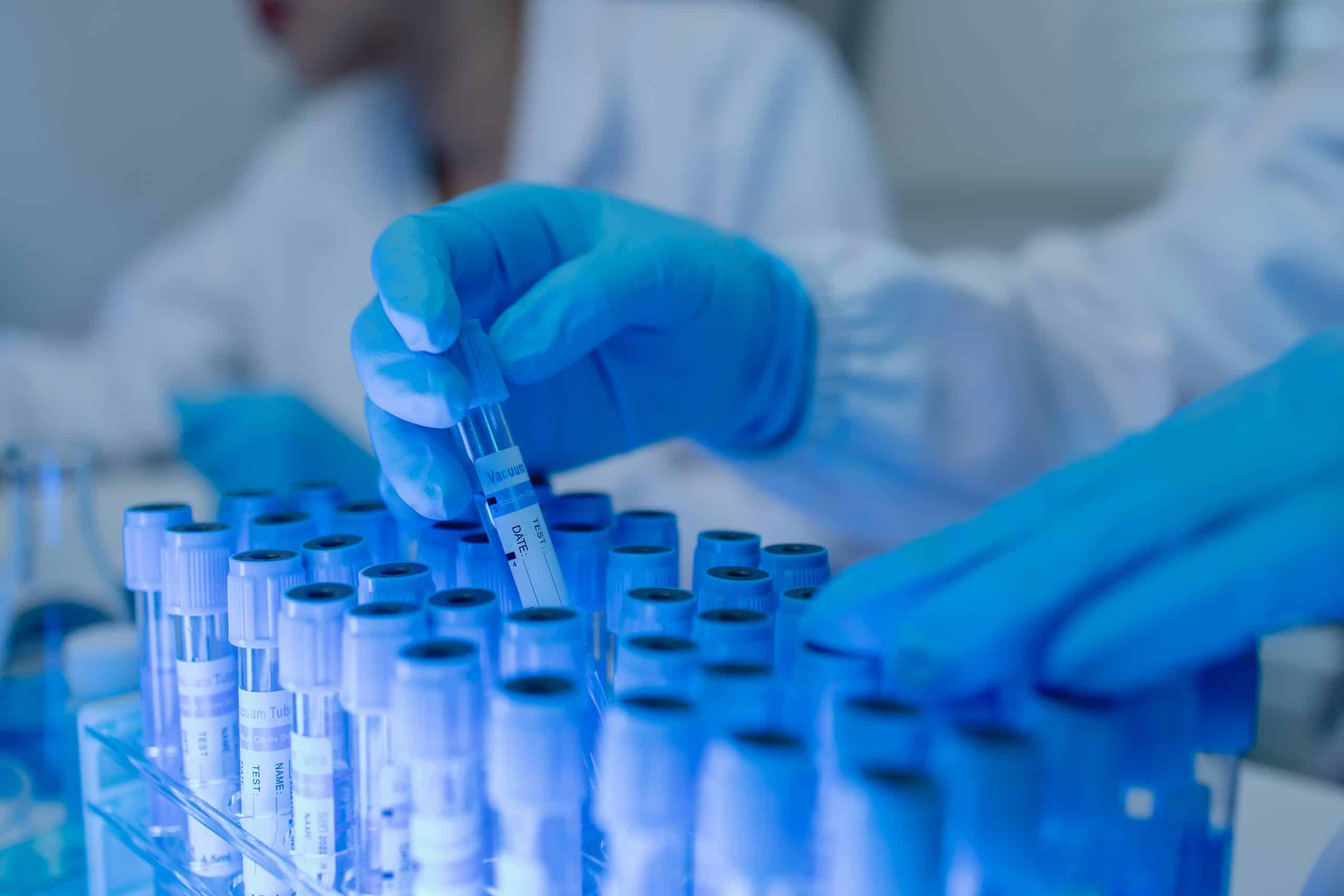 lab worker holding a test tube